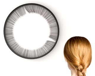 Illustration for article titled Watch the Seconds Blink By on This Freaky Eyelash Clock